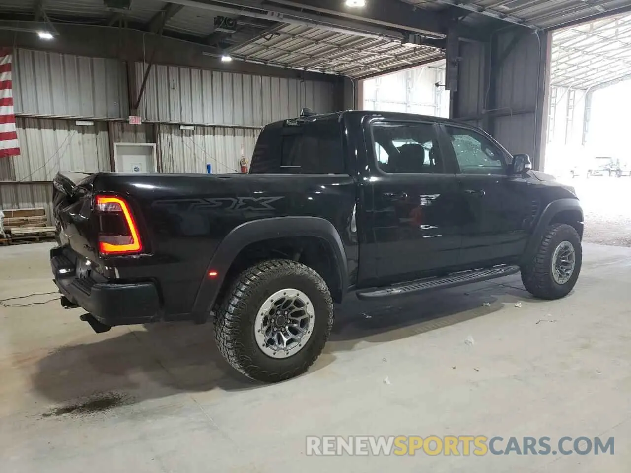 3 Photograph of a damaged car 1C6SRFU99NN320249 RAM 1500 2022
