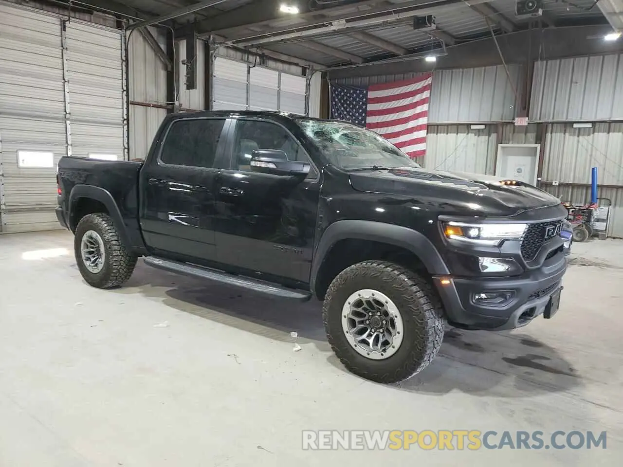 4 Photograph of a damaged car 1C6SRFU99NN320249 RAM 1500 2022