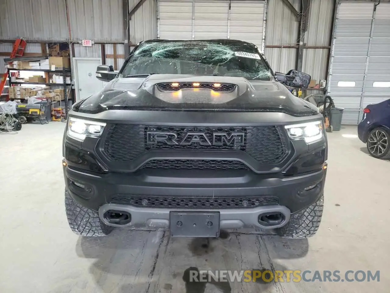 5 Photograph of a damaged car 1C6SRFU99NN320249 RAM 1500 2022