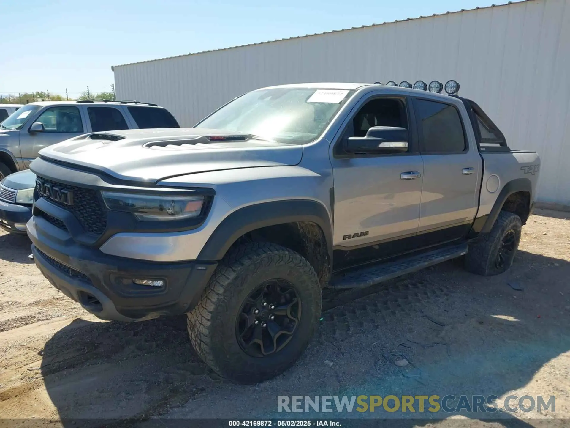 2 Photograph of a damaged car 1C6SRFU99NN357351 RAM 1500 2022