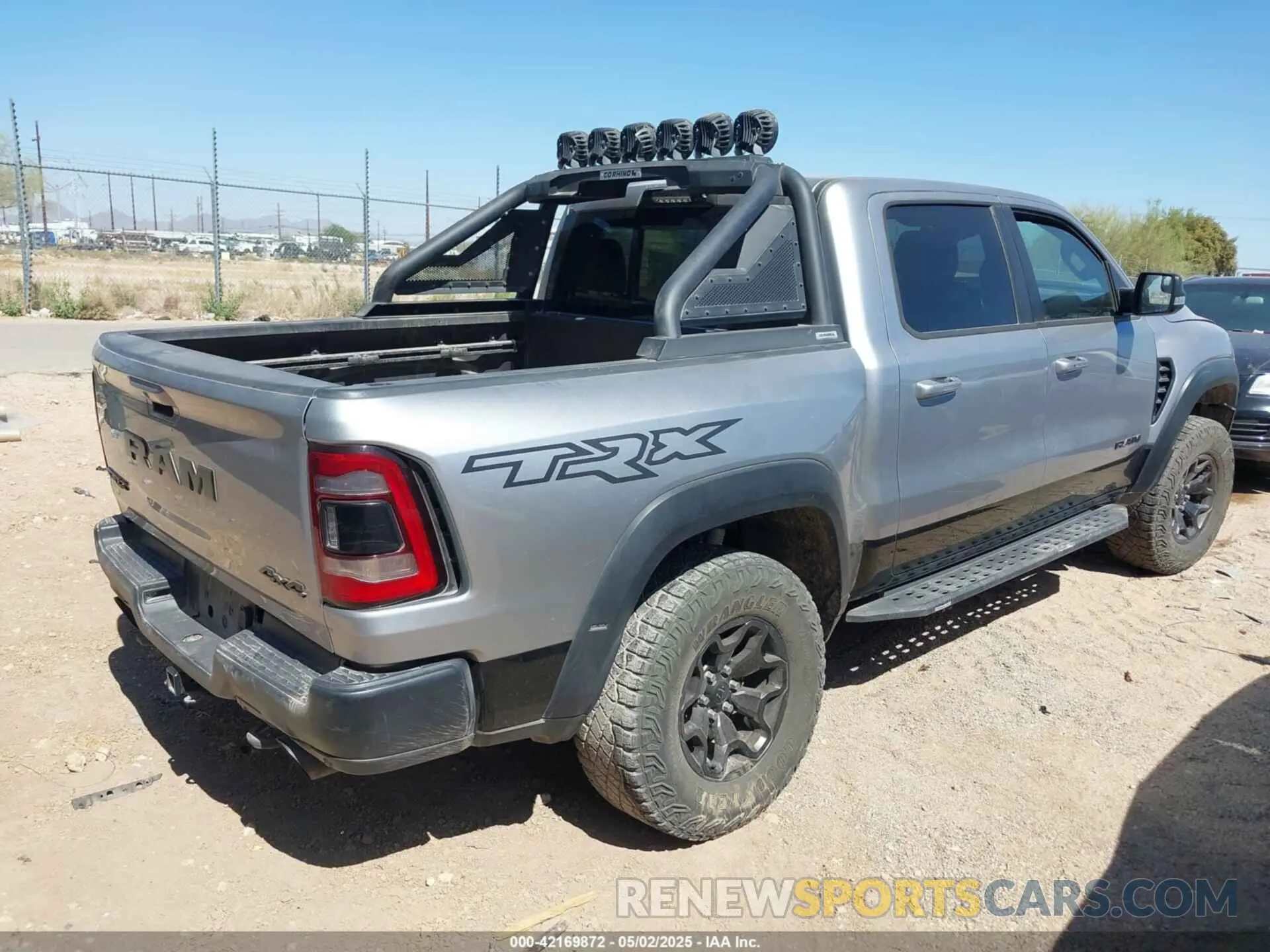 4 Photograph of a damaged car 1C6SRFU99NN357351 RAM 1500 2022