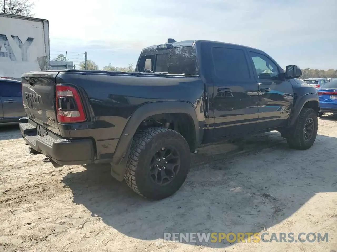 3 Photograph of a damaged car 1C6SRFU99NN430718 RAM 1500 2022
