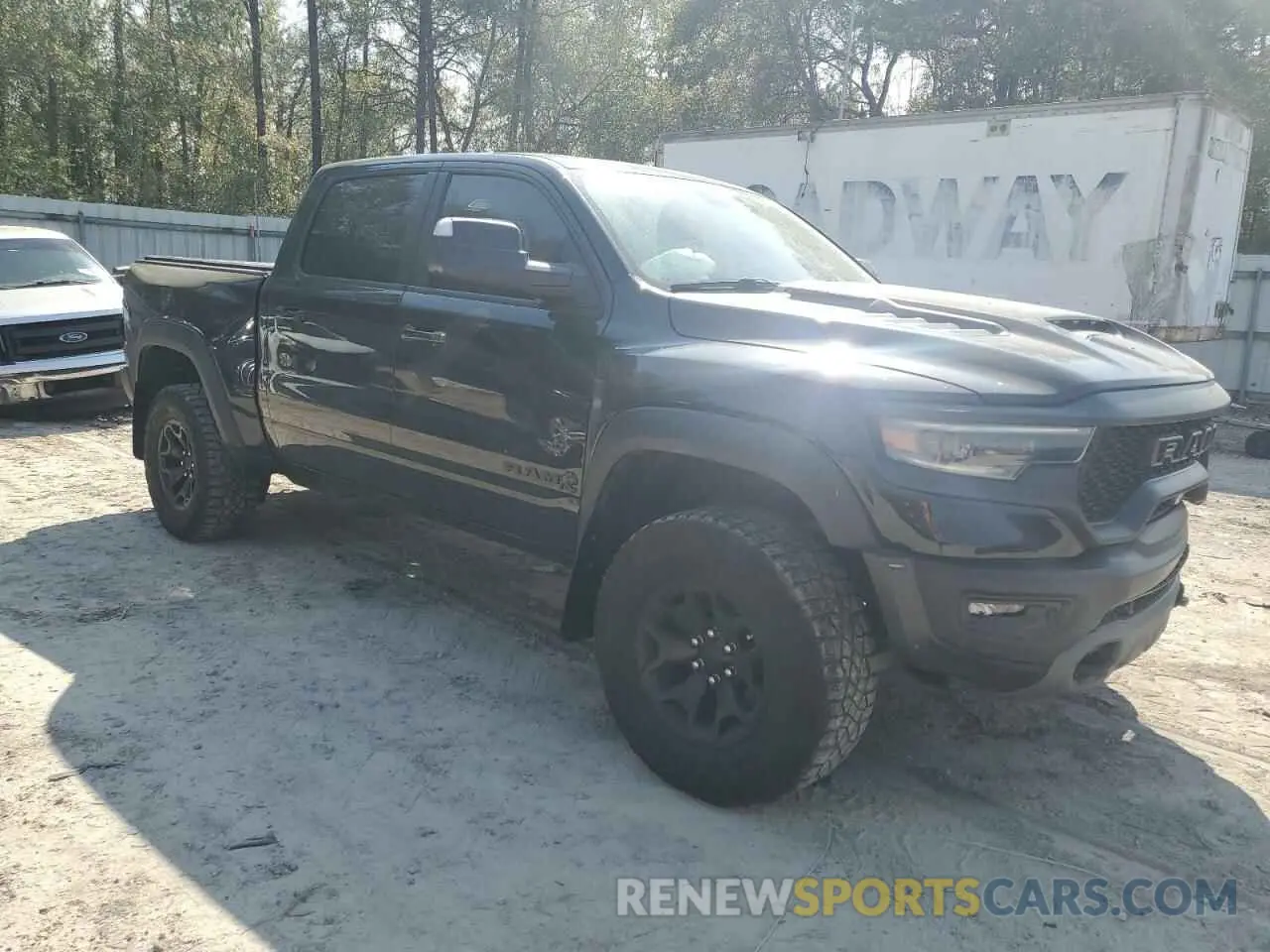 4 Photograph of a damaged car 1C6SRFU99NN430718 RAM 1500 2022