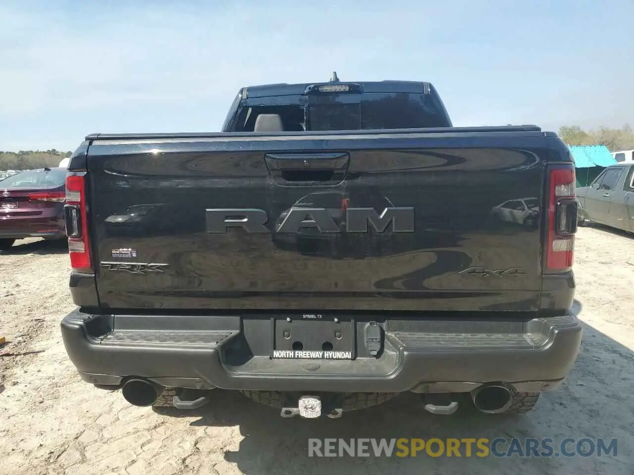 6 Photograph of a damaged car 1C6SRFU99NN430718 RAM 1500 2022