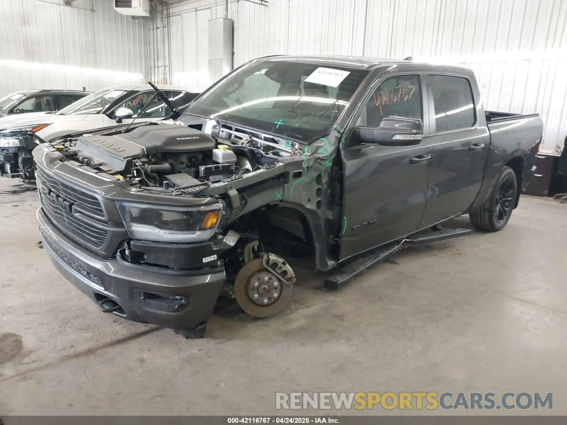 2 Photograph of a damaged car 1C6SRFVT2NN432644 RAM 1500 2022