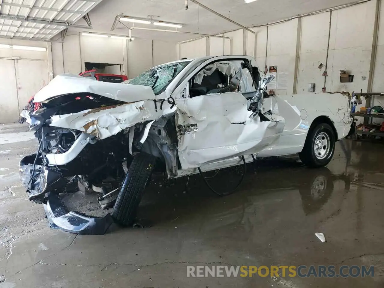 1 Photograph of a damaged car 3C6JR6DG5NG427804 RAM 1500 2022