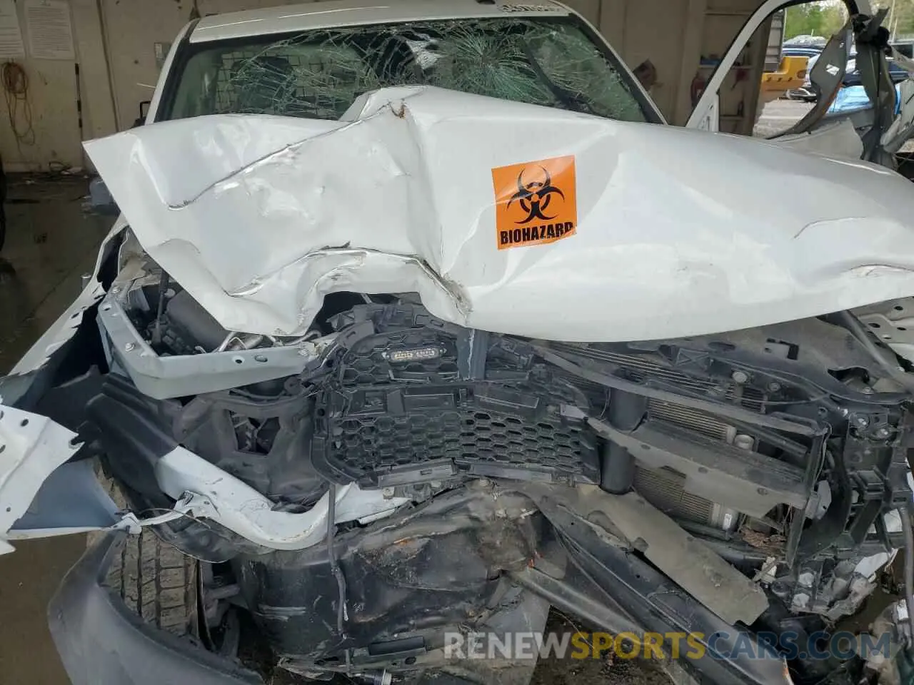 11 Photograph of a damaged car 3C6JR6DG5NG427804 RAM 1500 2022