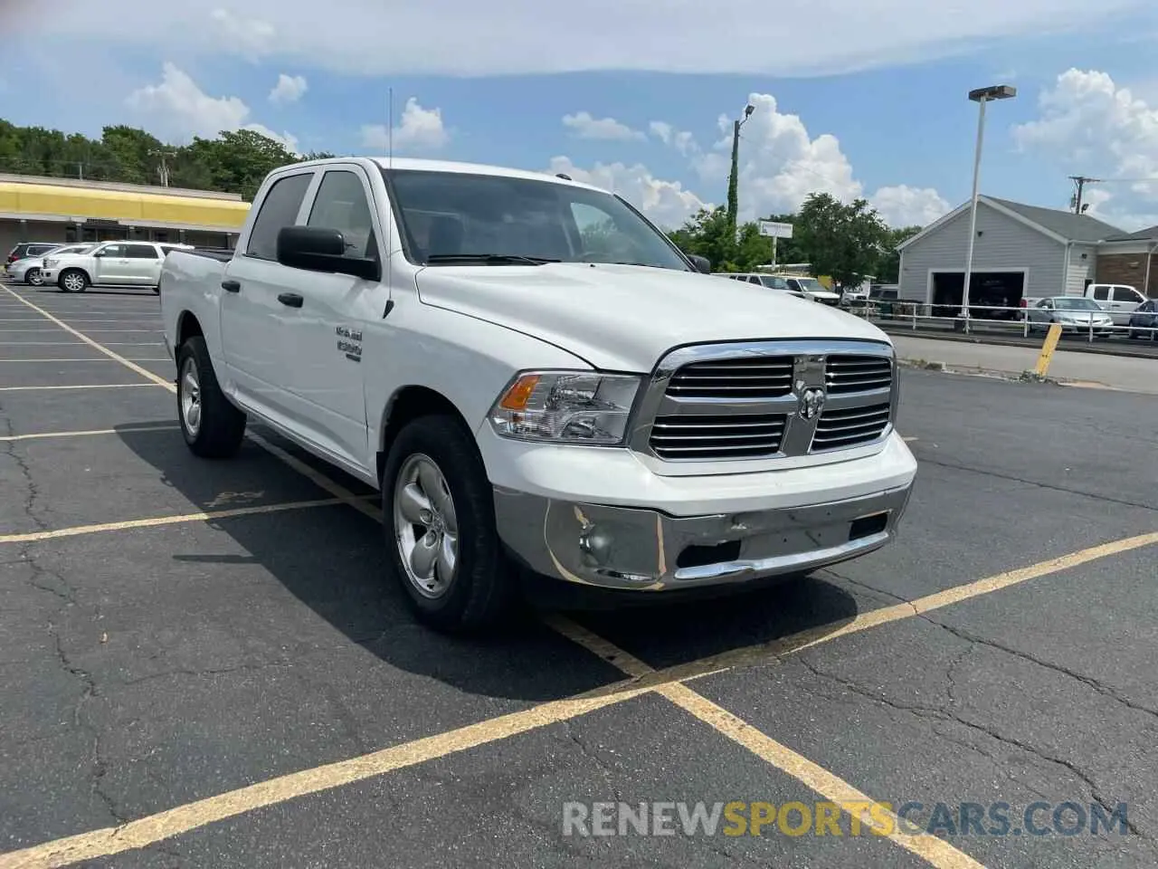 1 Photograph of a damaged car 3C6RR6KG0NG210652 RAM 1500 2022