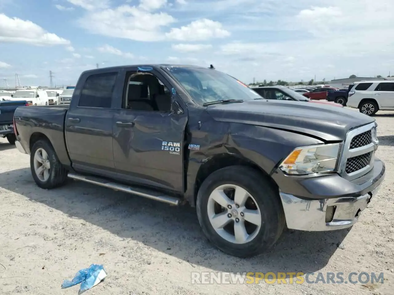 4 Photograph of a damaged car 3C6RR6KT2NG172404 RAM 1500 2022