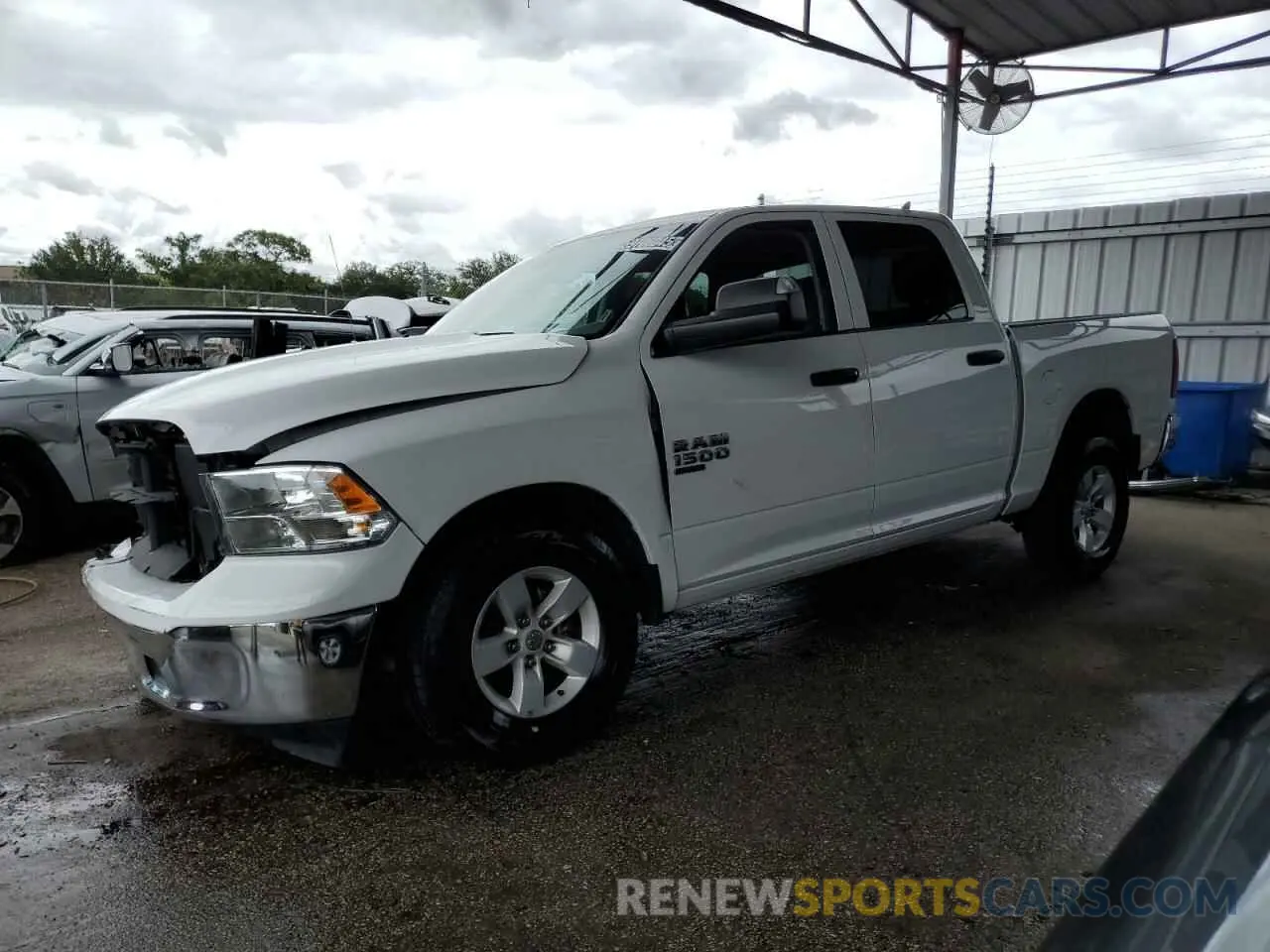 1 Photograph of a damaged car 1C6RR6LG6PS580210 RAM 1500 2023
