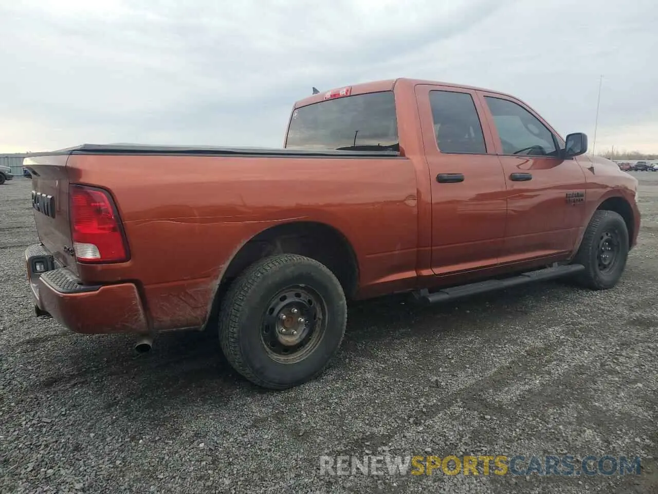 3 Photograph of a damaged car 1C6RR7FG4PS580398 RAM 1500 2023