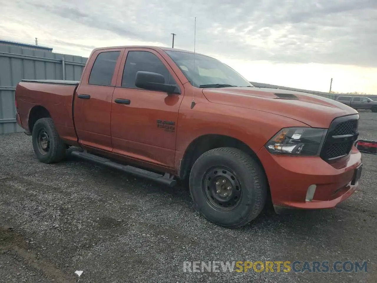 4 Photograph of a damaged car 1C6RR7FG4PS580398 RAM 1500 2023