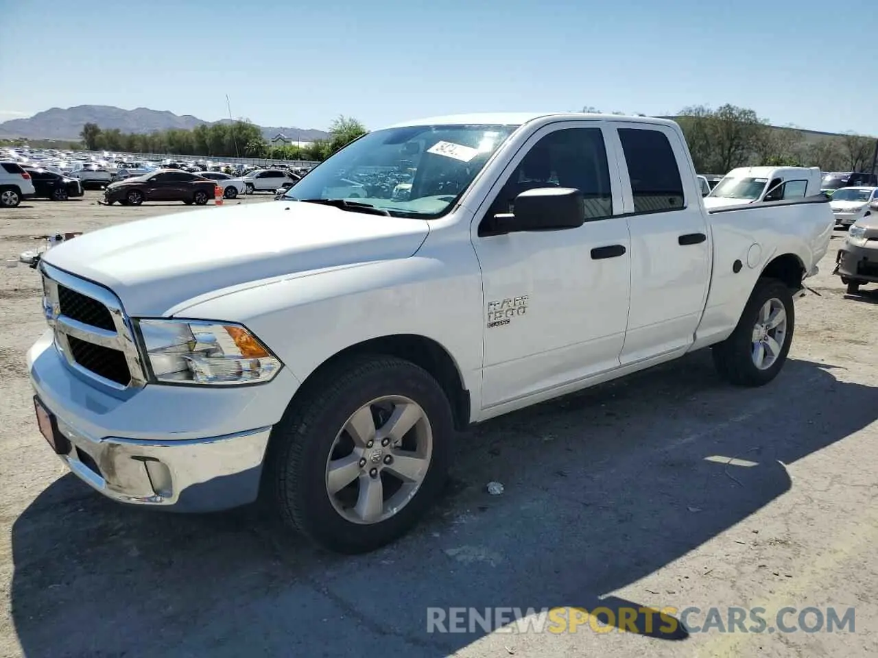 1 Photograph of a damaged car 1C6RR7FG8PS540065 RAM 1500 2023