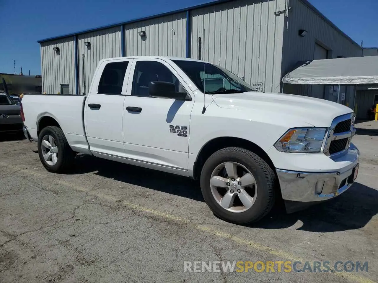 4 Photograph of a damaged car 1C6RR7FG8PS540065 RAM 1500 2023