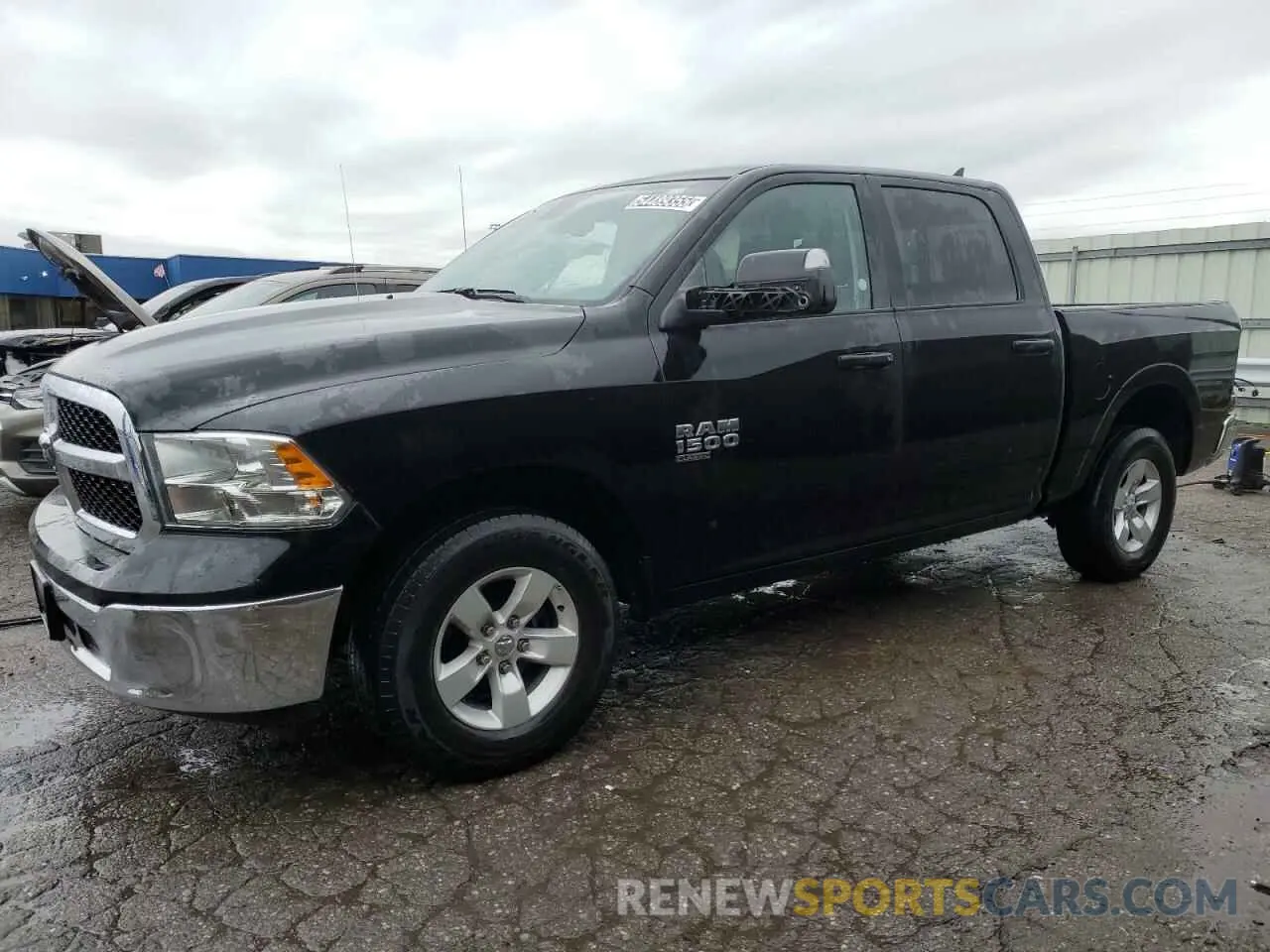 1 Photograph of a damaged car 1C6RR7LG3PS517071 RAM 1500 2023