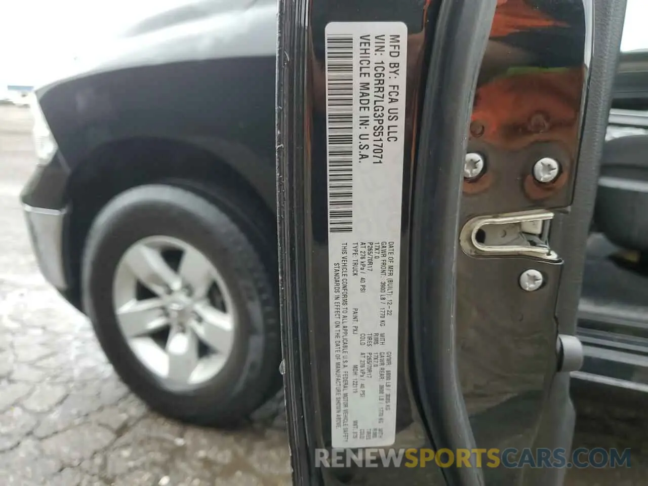 13 Photograph of a damaged car 1C6RR7LG3PS517071 RAM 1500 2023