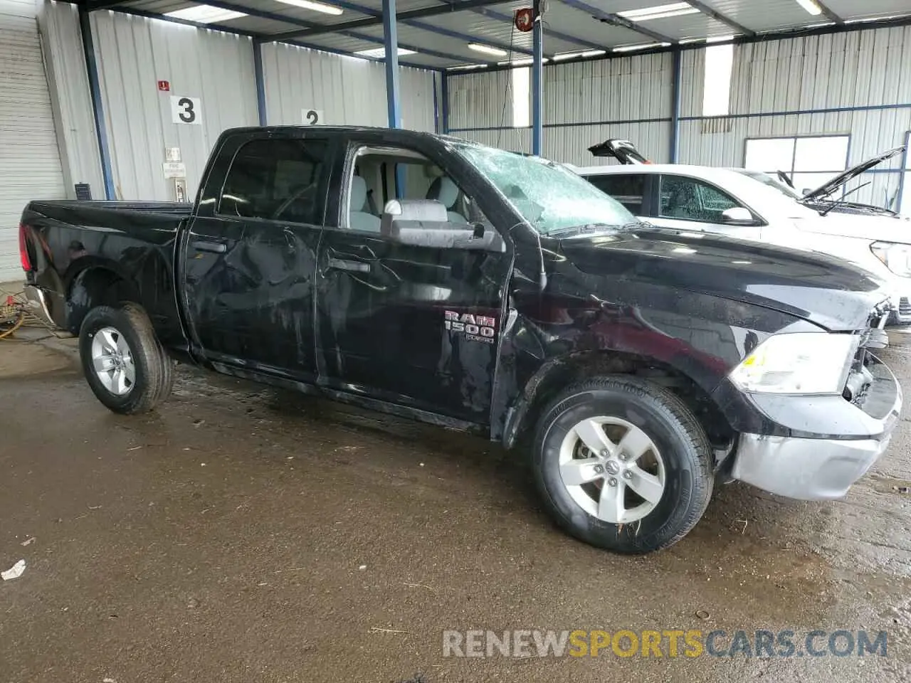 4 Photograph of a damaged car 1C6RR7LG8PS517373 RAM 1500 2023