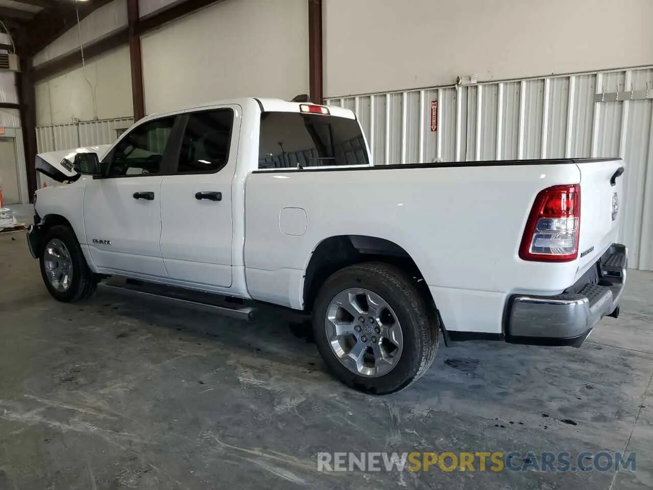 2 Photograph of a damaged car 1C6RREBT0PN586091 RAM 1500 2023