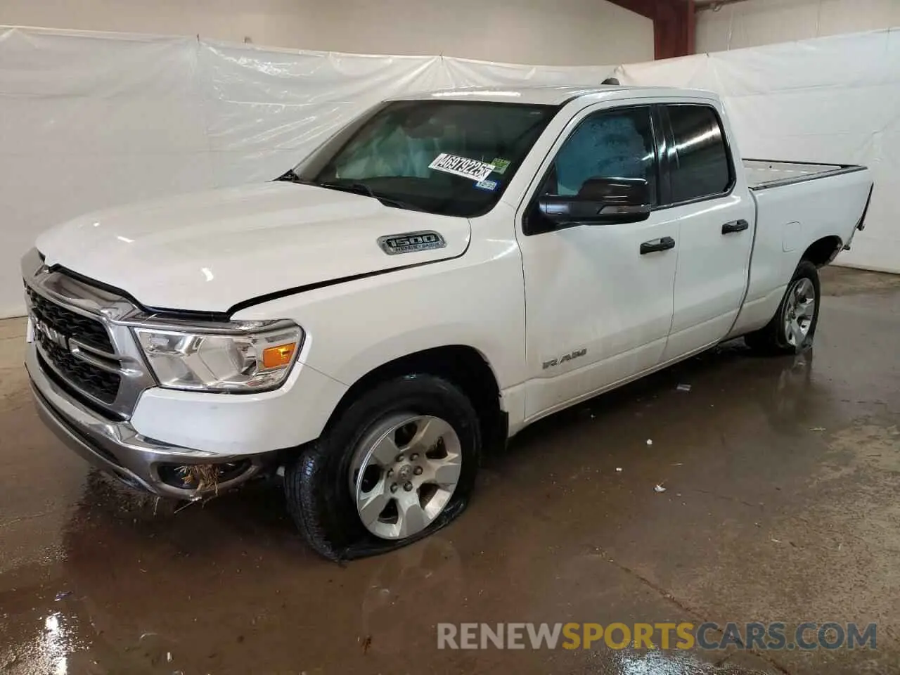 1 Photograph of a damaged car 1C6RREBT7PN545960 RAM 1500 2023
