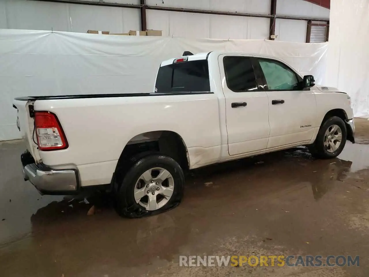 3 Photograph of a damaged car 1C6RREBT7PN545960 RAM 1500 2023