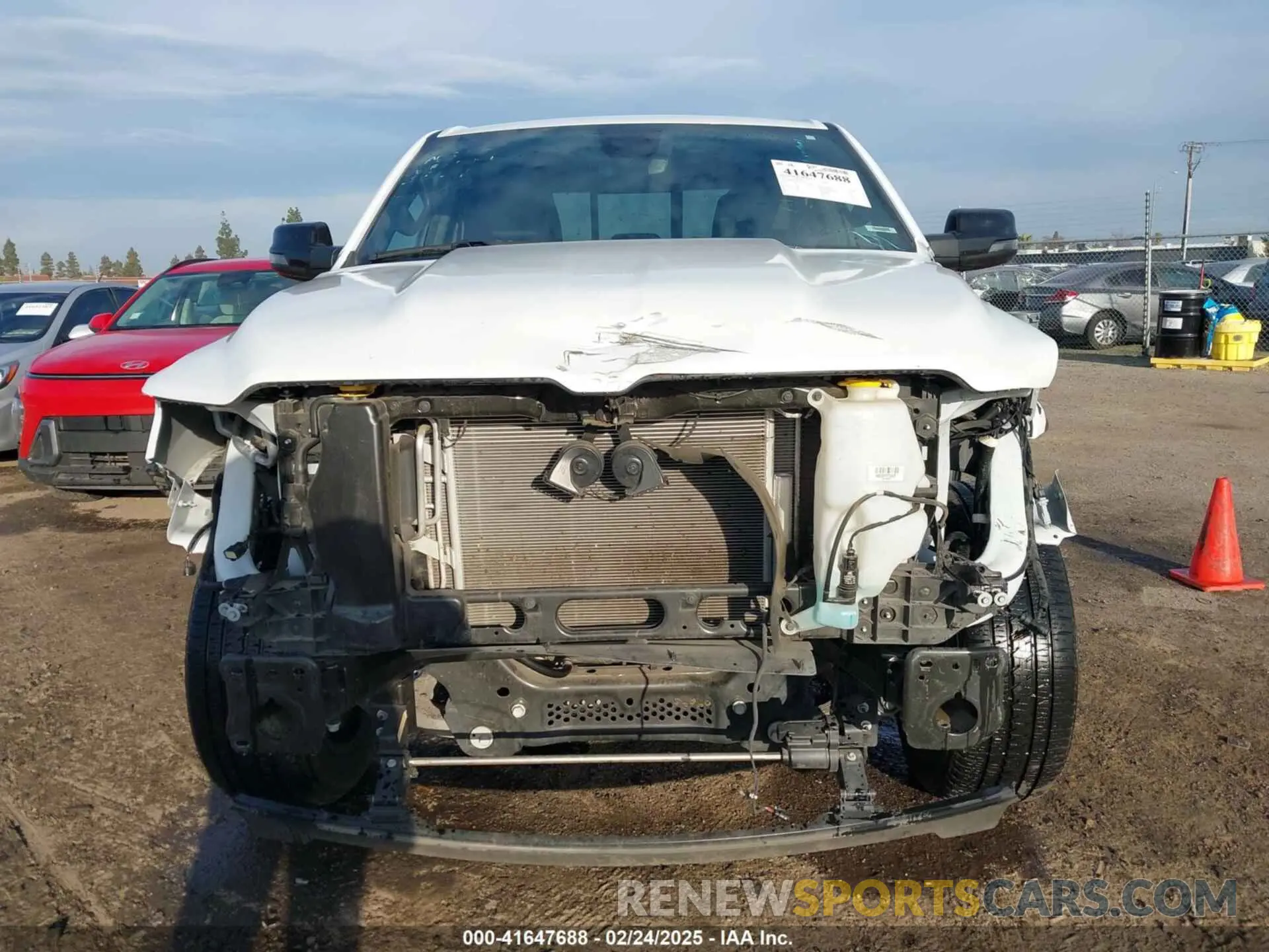 13 Photograph of a damaged car 1C6RREBT8PN553095 RAM 1500 2023