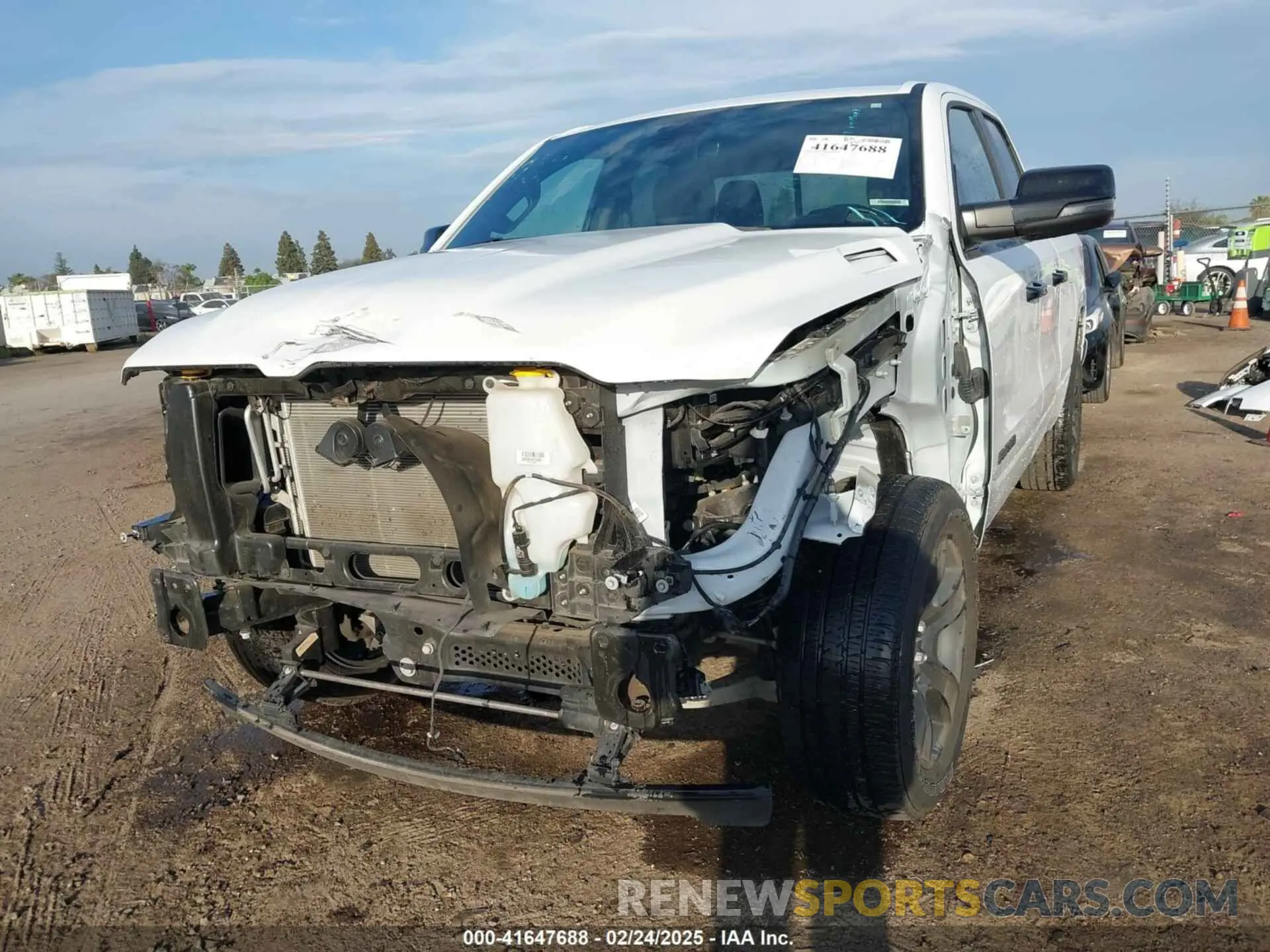 2 Photograph of a damaged car 1C6RREBT8PN553095 RAM 1500 2023