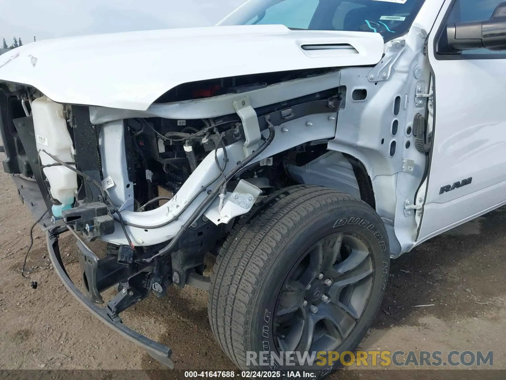 21 Photograph of a damaged car 1C6RREBT8PN553095 RAM 1500 2023