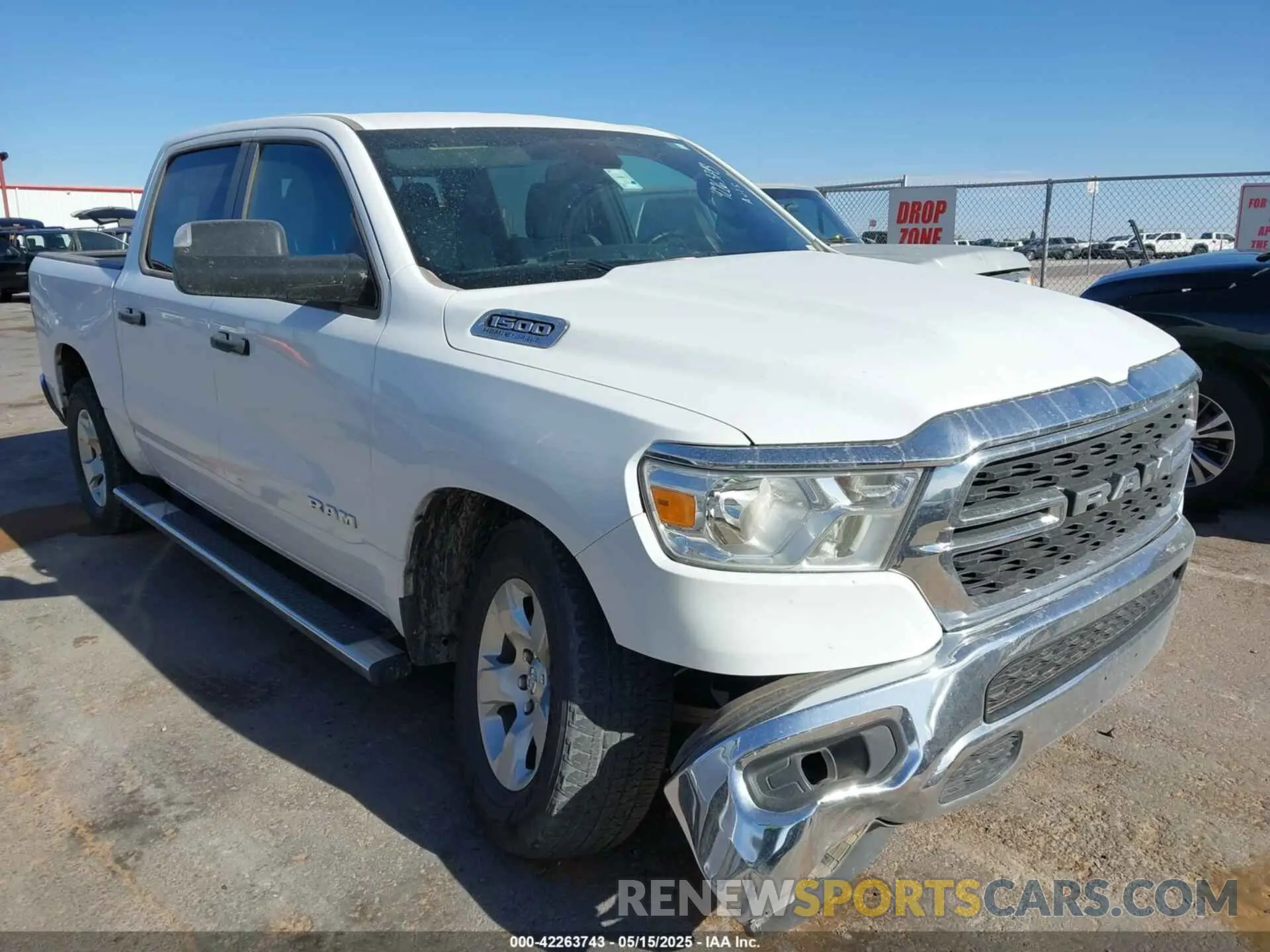 1 Photograph of a damaged car 1C6RREFT1PN693046 RAM 1500 2023