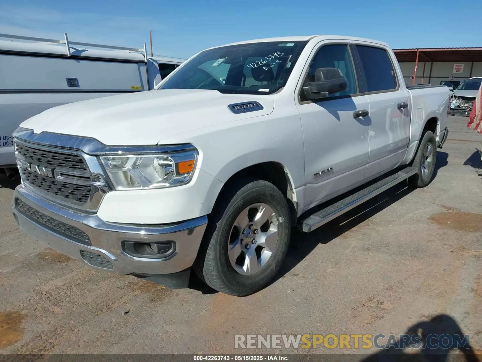 2 Photograph of a damaged car 1C6RREFT1PN693046 RAM 1500 2023