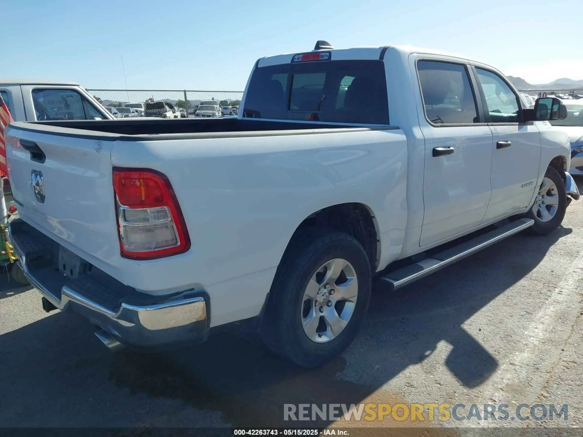 4 Photograph of a damaged car 1C6RREFT1PN693046 RAM 1500 2023