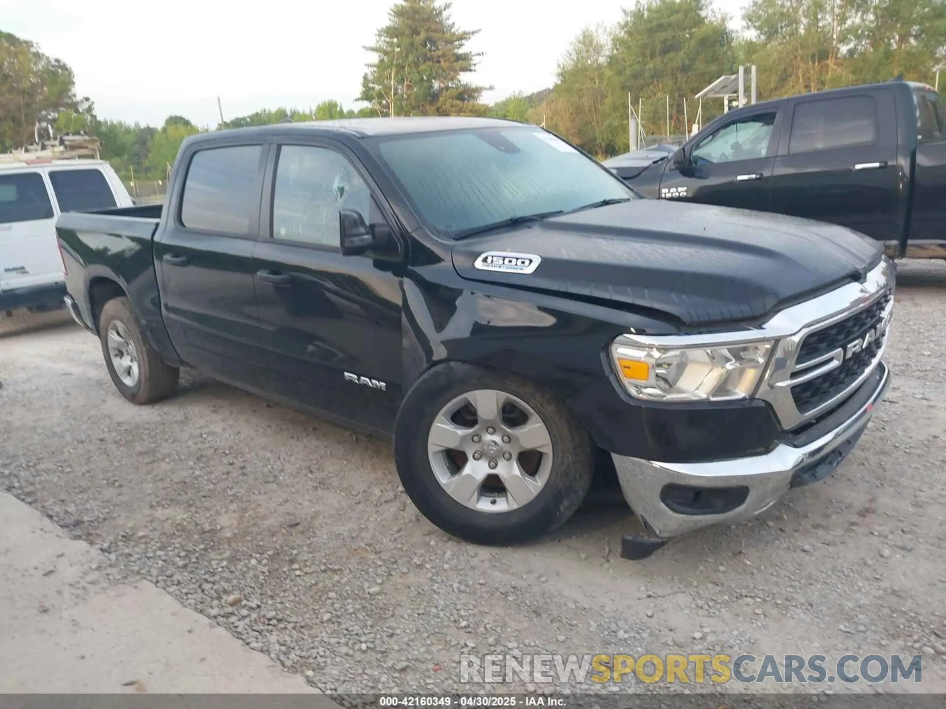 1 Photograph of a damaged car 1C6RREFT3PN543679 RAM 1500 2023
