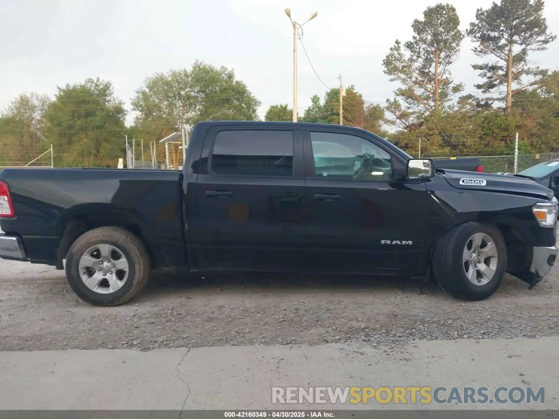 13 Photograph of a damaged car 1C6RREFT3PN543679 RAM 1500 2023