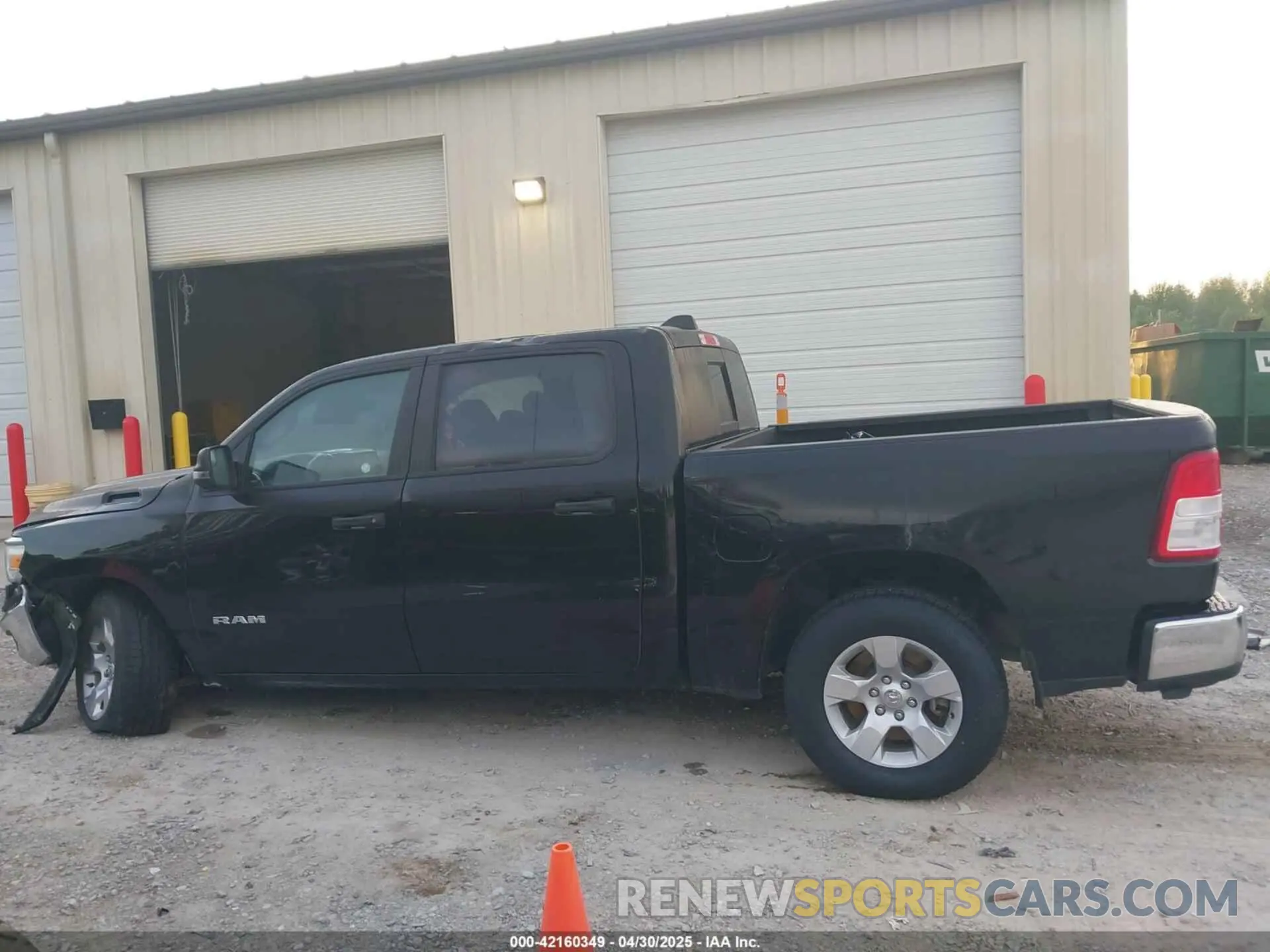 14 Photograph of a damaged car 1C6RREFT3PN543679 RAM 1500 2023