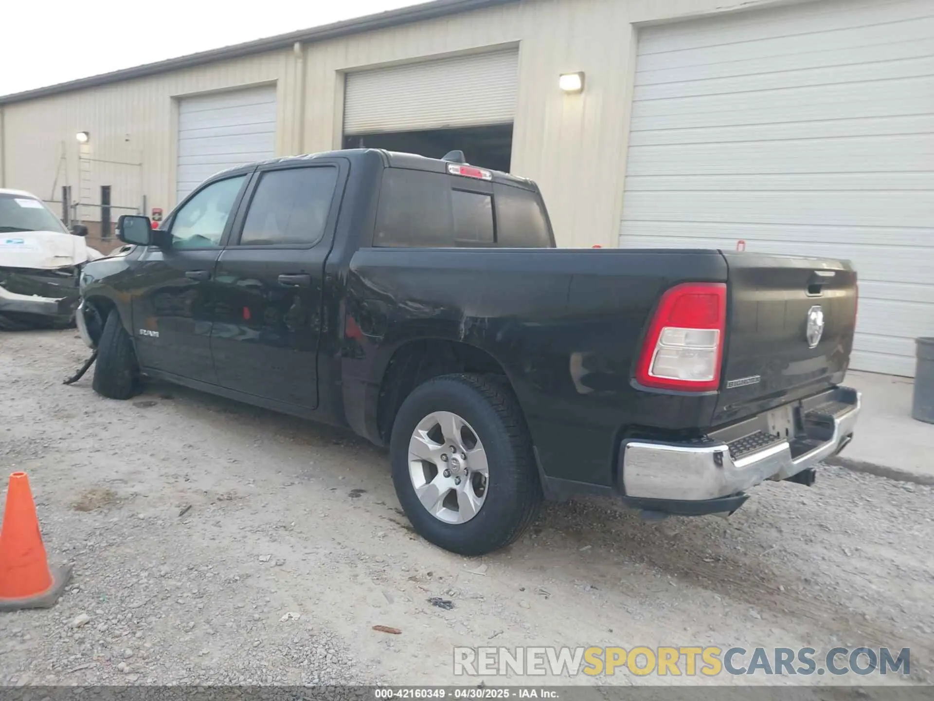 3 Photograph of a damaged car 1C6RREFT3PN543679 RAM 1500 2023