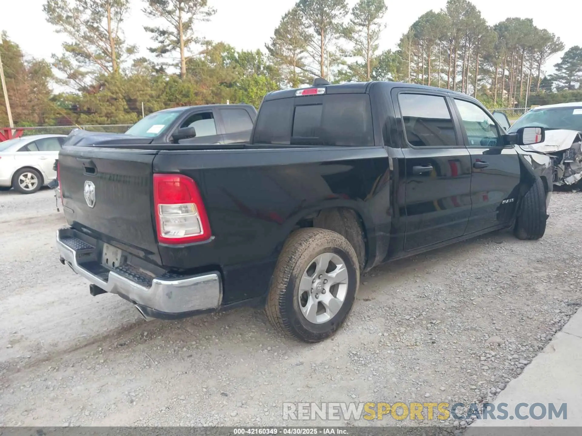 4 Photograph of a damaged car 1C6RREFT3PN543679 RAM 1500 2023