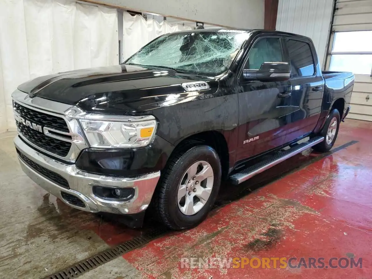 1 Photograph of a damaged car 1C6RREFT4PN559745 RAM 1500 2023