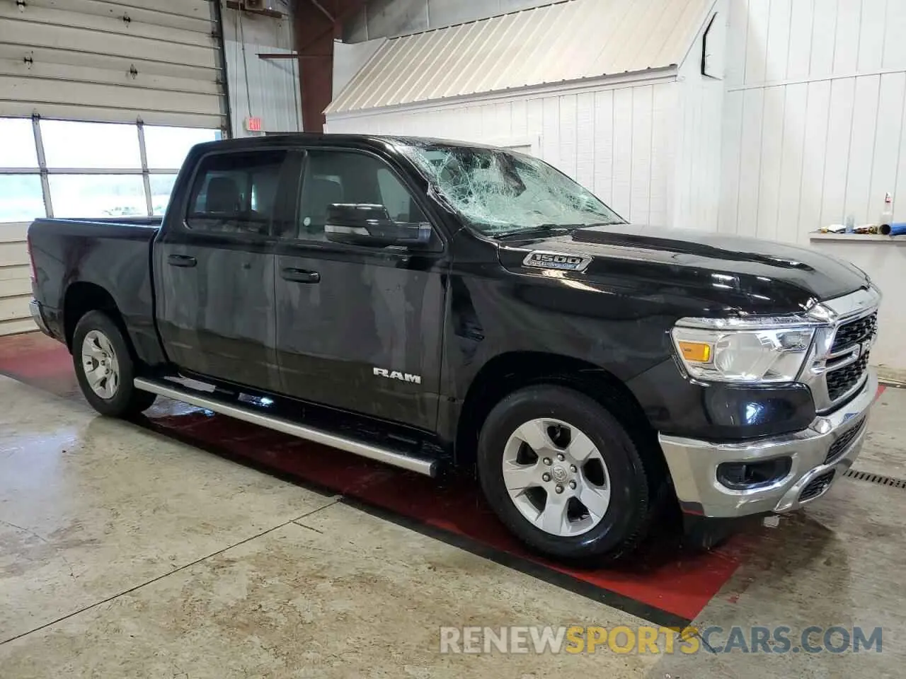 4 Photograph of a damaged car 1C6RREFT4PN559745 RAM 1500 2023