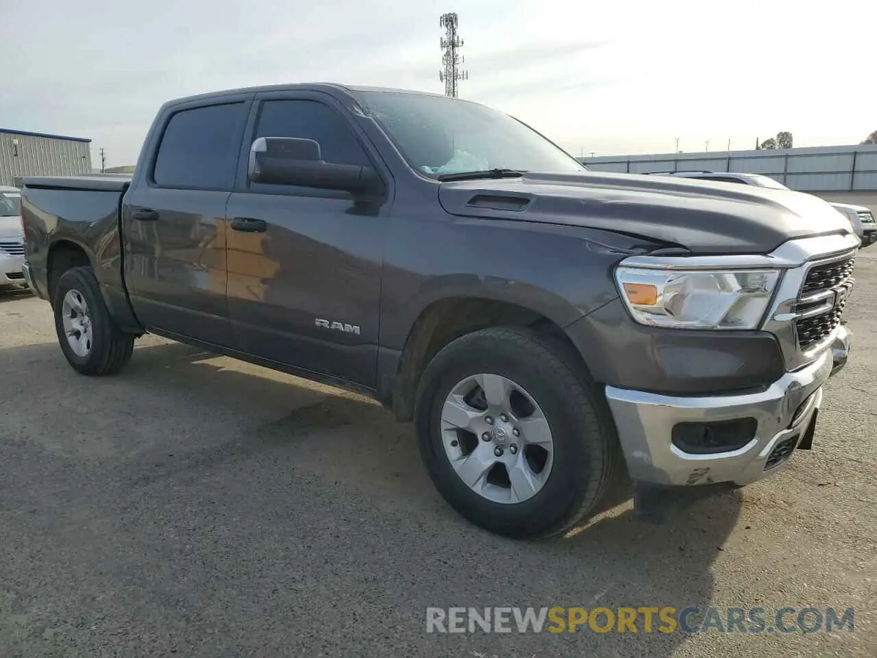 4 Photograph of a damaged car 1C6RREFT6PN608282 RAM 1500 2023