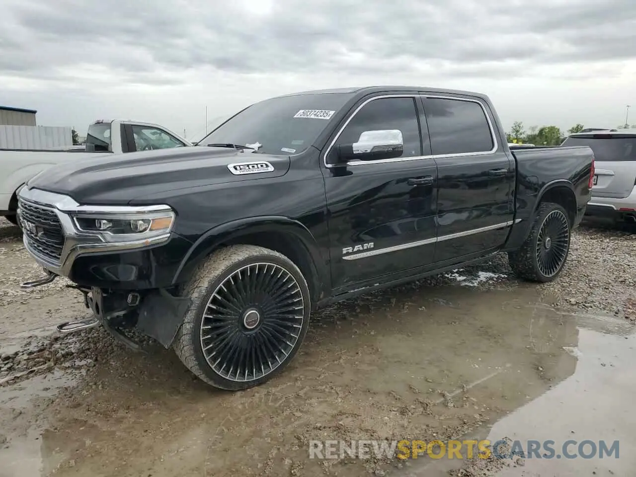 1 Photograph of a damaged car 1C6RREHTXPN604684 RAM 1500 2023