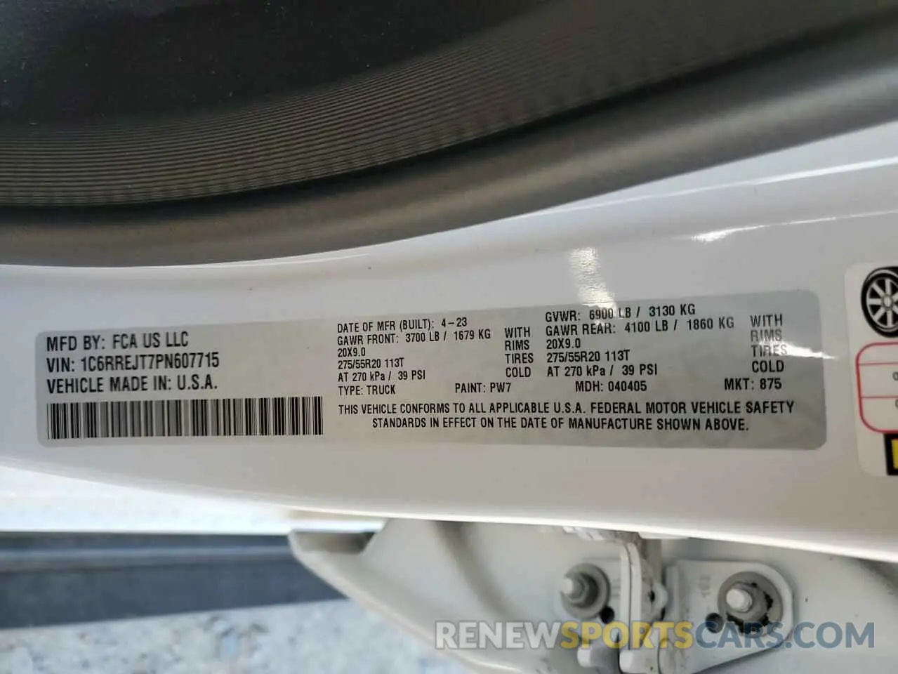 13 Photograph of a damaged car 1C6RREJT7PN607715 RAM 1500 2023