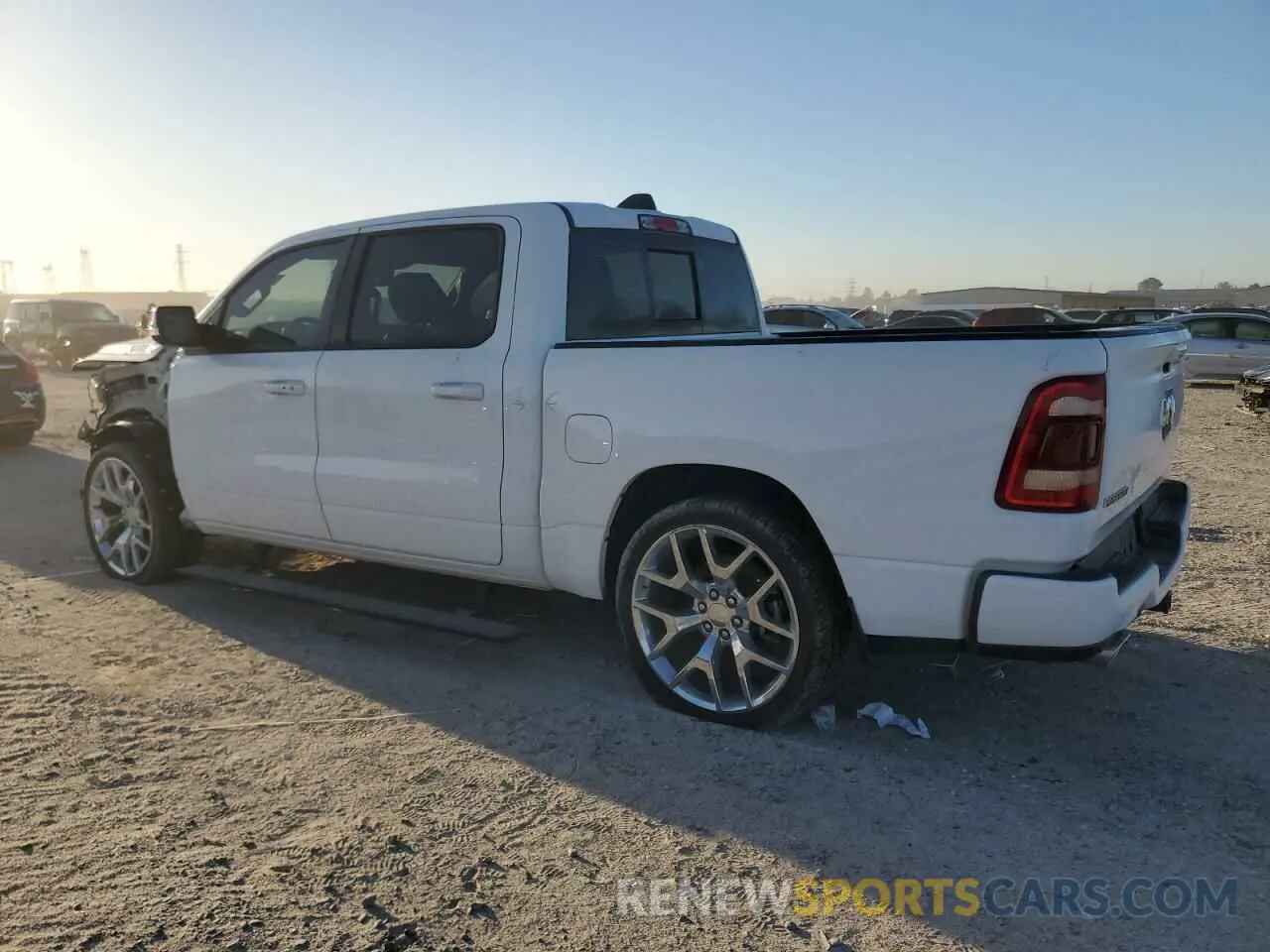 2 Photograph of a damaged car 1C6RREJT7PN607715 RAM 1500 2023