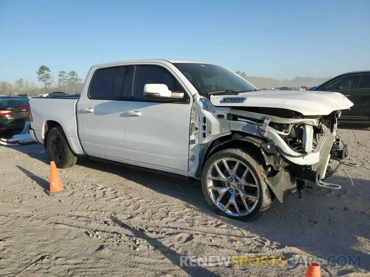 4 Photograph of a damaged car 1C6RREJT7PN607715 RAM 1500 2023