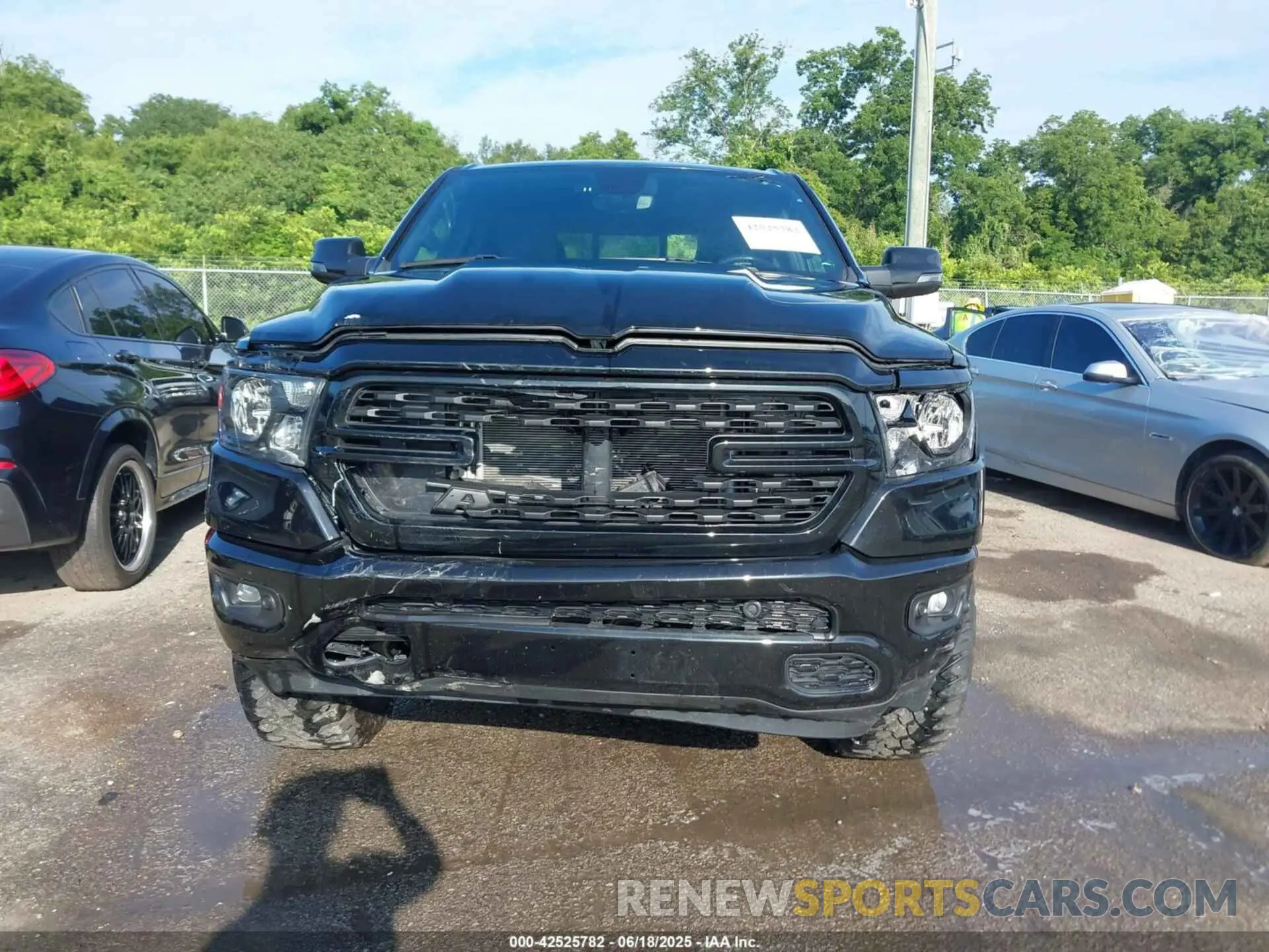 12 Photograph of a damaged car 1C6RREMT2PN664903 RAM 1500 2023