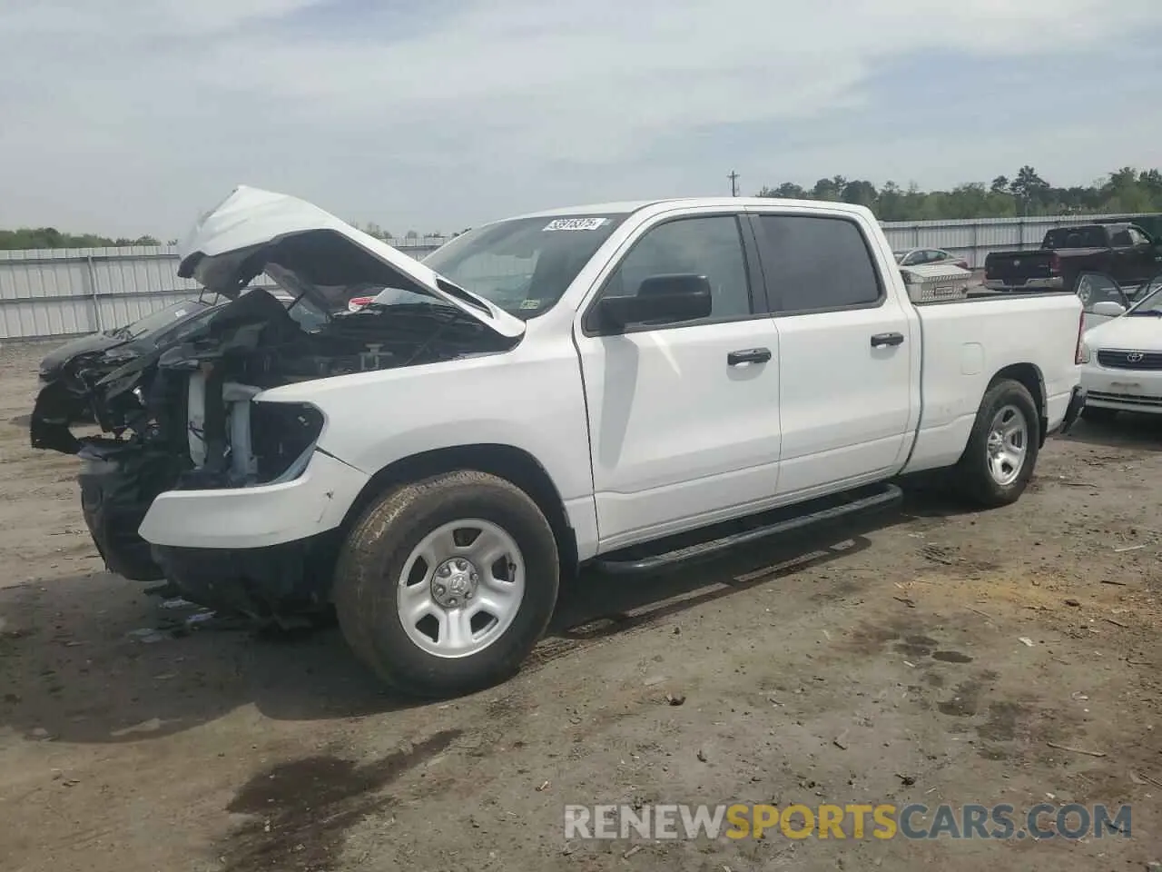 1 Photograph of a damaged car 1C6RRENT5PN607402 RAM 1500 2023
