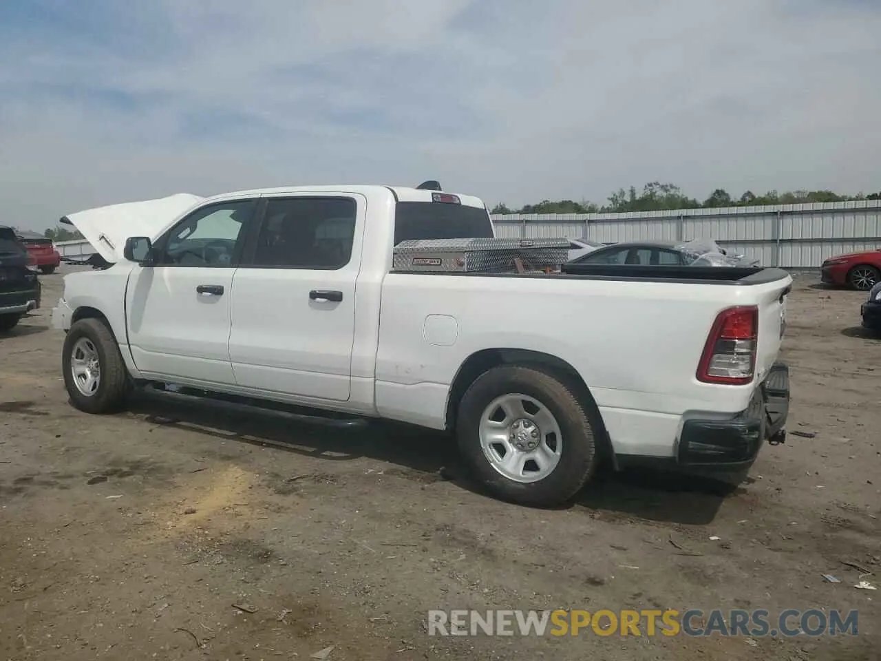 2 Photograph of a damaged car 1C6RRENT5PN607402 RAM 1500 2023