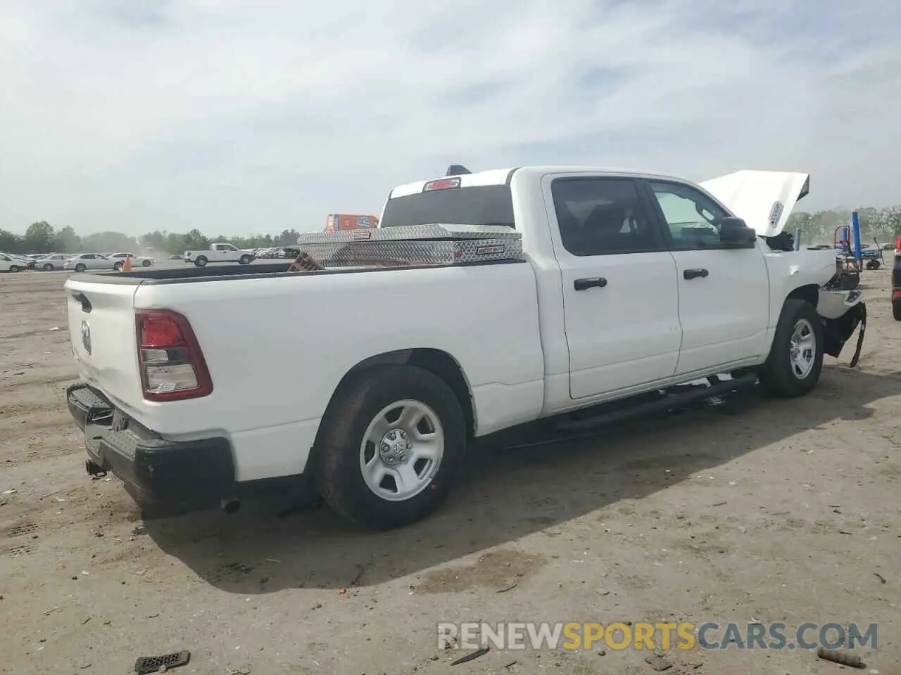 3 Photograph of a damaged car 1C6RRENT5PN607402 RAM 1500 2023