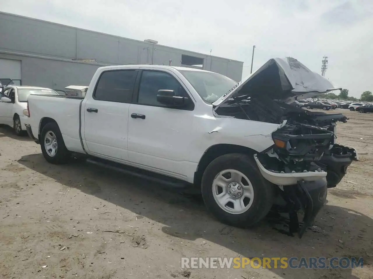4 Photograph of a damaged car 1C6RRENT5PN607402 RAM 1500 2023