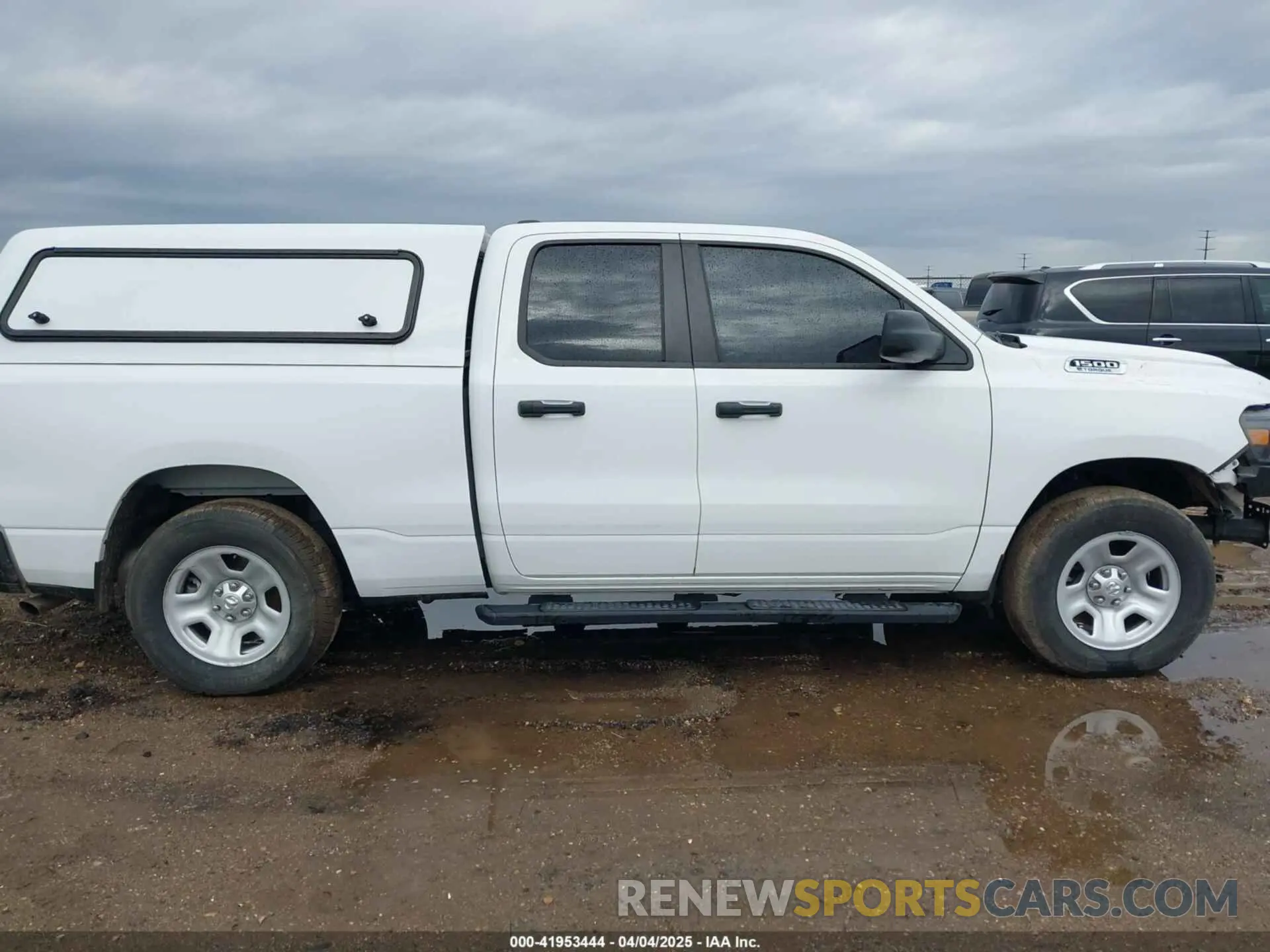 14 Photograph of a damaged car 1C6RRFCG9PN546423 RAM 1500 2023