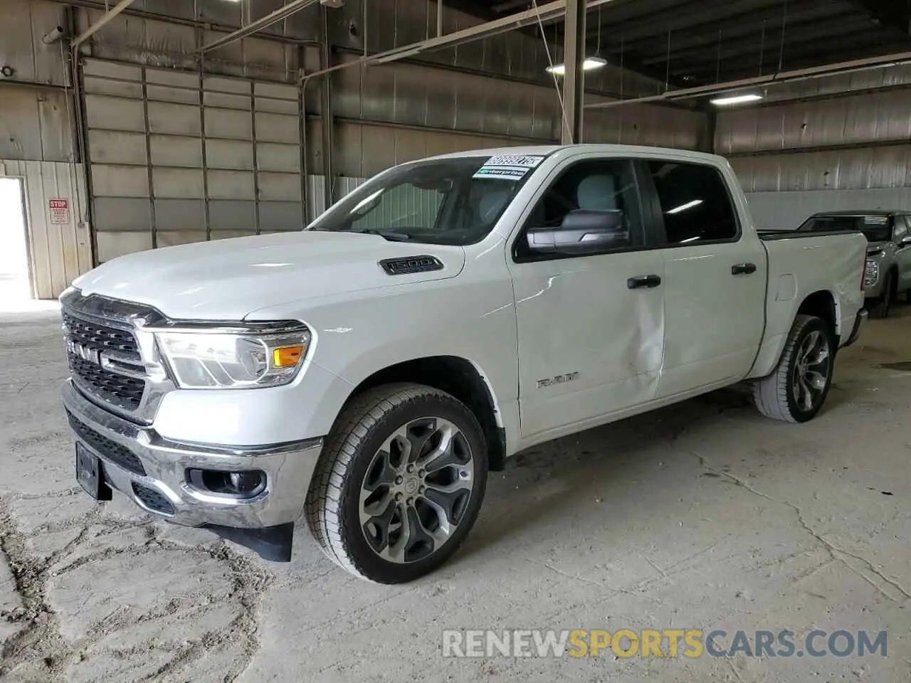 1 Photograph of a damaged car 1C6RRFFG2PN518748 RAM 1500 2023