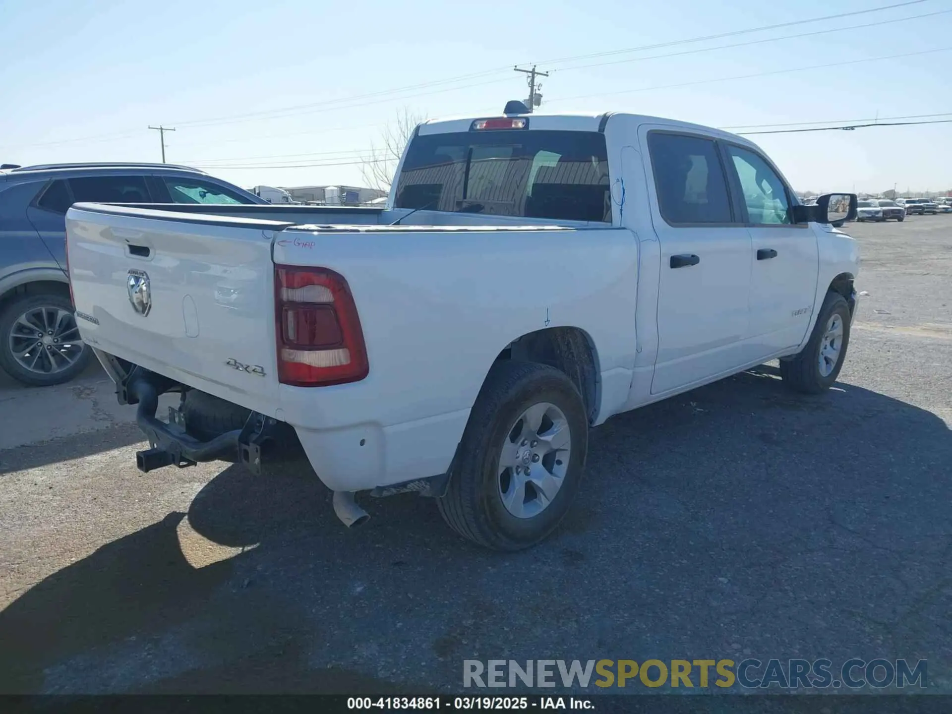 4 Photograph of a damaged car 1C6RRFFG5PN694533 RAM 1500 2023